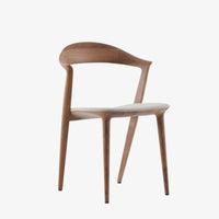 Chaise Addo marque artisan structure noyer et assise tissu
